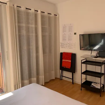 Quarto em Acomodações Particulares D Avec Clim Terrasse Et Petit Dejeuner Hauteurs De *